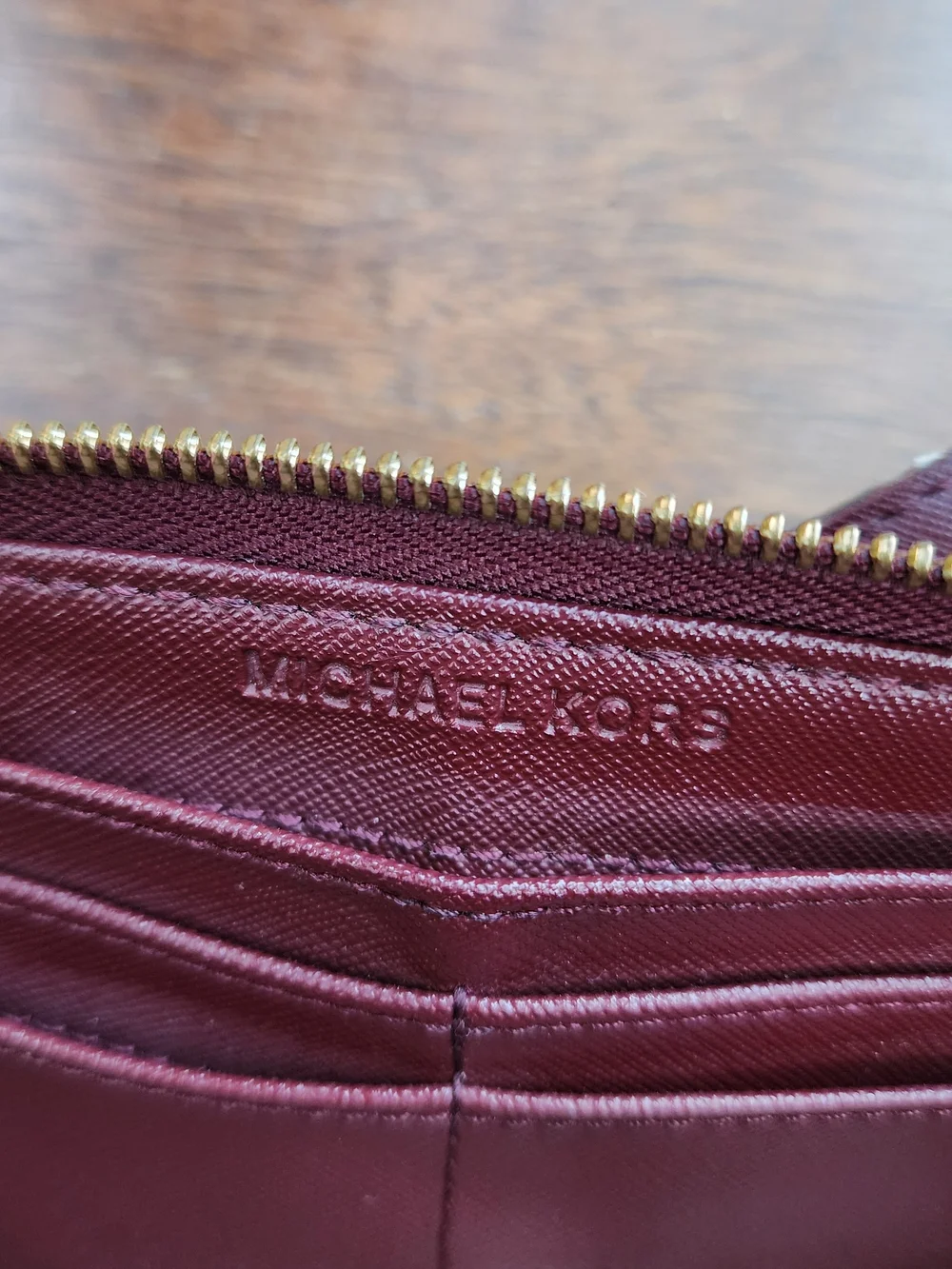 Michael Kors Burgundy Saffiano Leather Zip Around Wristlet Wallet